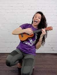 woman playing ukulele
