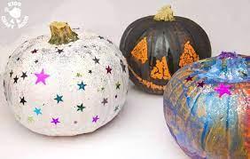 three painted pumpkins