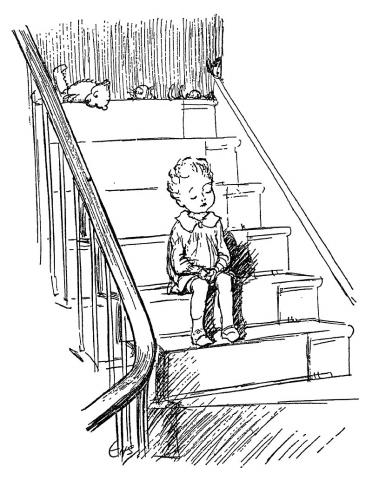 Small boy sitting on stairs with toys at the stairs top