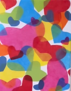 colorful tissue paper hearts glued on canvas
