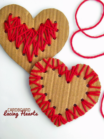 Two brown hearts overlapped with red yarn woven inside.