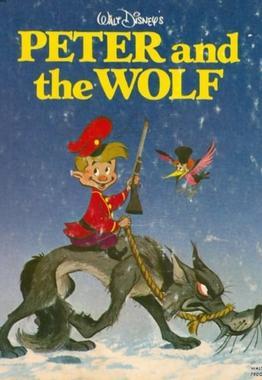 Peter in a red cap and coat standing over the mean wolf with a bird twittering on his right.