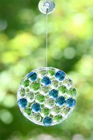 blue green and clear glass beads as a suncatcher
