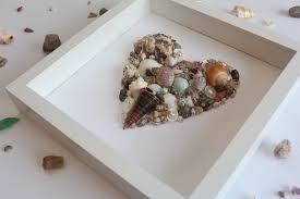 heart made of shells in a shadowbox