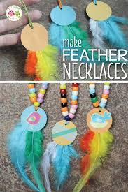 beaded necklace with round pendant and feathers hanging down