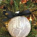 an ornament on a Christmas tree made from recycled book pages