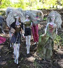 barbie dolls decorated to look like zombies