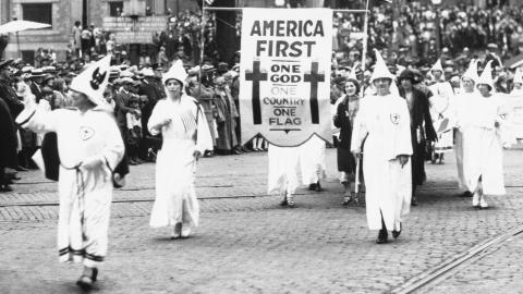 black and white photo of a KKK rally