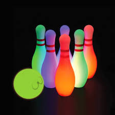 glow in the dark bowling ball and pins