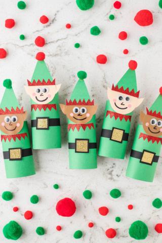 five elves made of cardboard tubes and construction paper