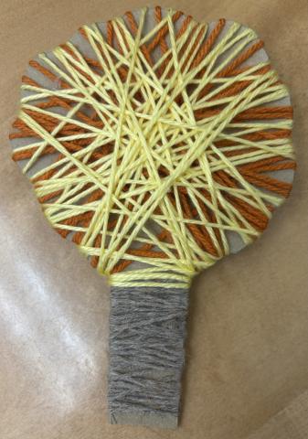 fall tree wrapped with yarn