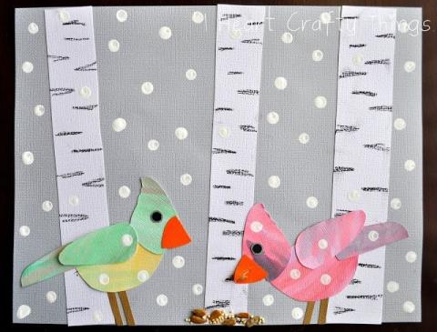 mixed media canvas with paint and paper to show a snowy day with aspen trees and two birds