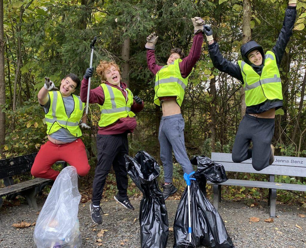 volunteers cleaning up trash