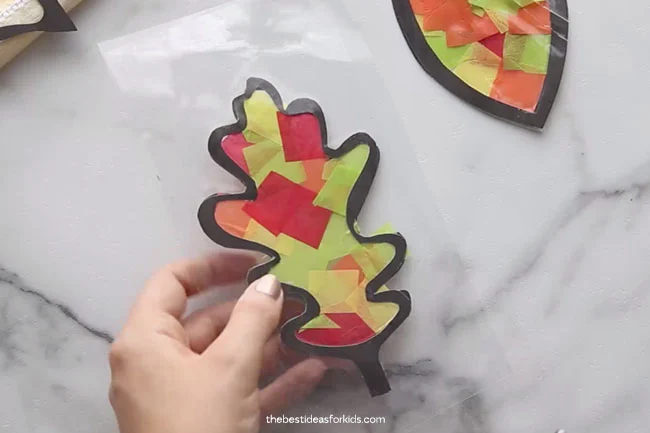 leaf shaped suncatcher made with tissue paper