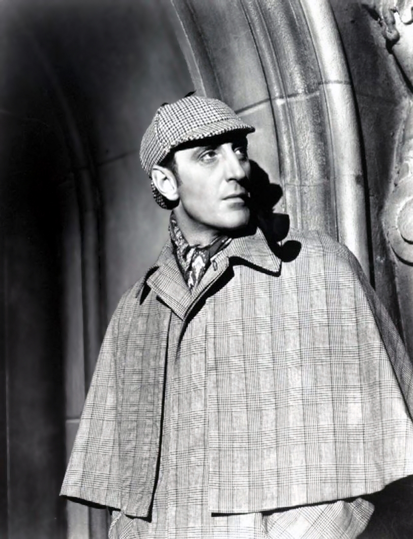 Basil Rathbone as Sherlock Holmes. Photograph is in black and white.