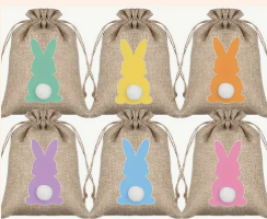 brown bags decorated with colorful bunnies and a white tail