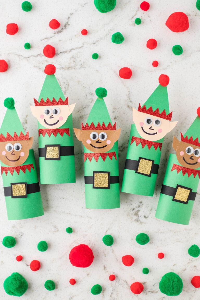 five elves made of cardboard tubes and construction paper