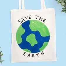 tote bag with earth painted on it and the words Save The Earth around it
